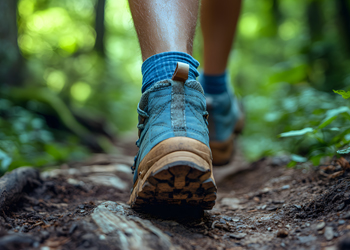 closeup of hiker walking on path