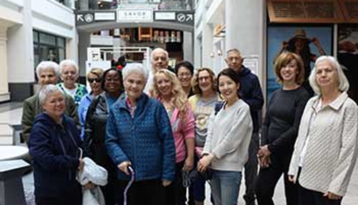 group of men and women in mall ready to walk