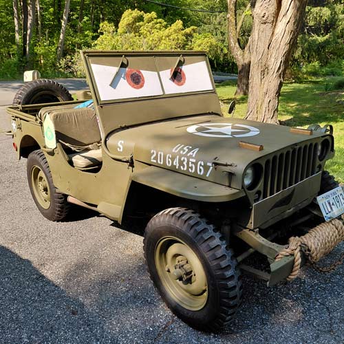 image of military jeep with character eyes in windshield