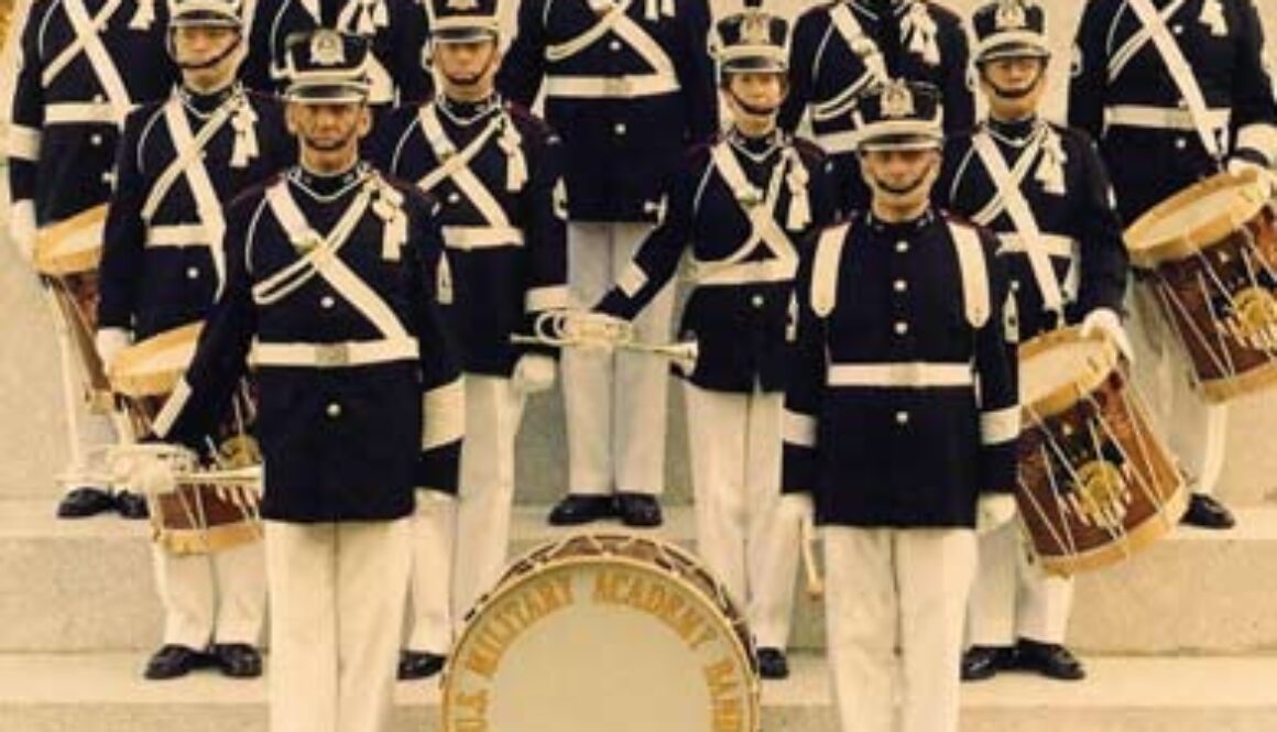 group of west point musicians posing on steps